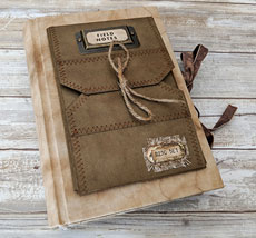 Brown journal cover with envelope