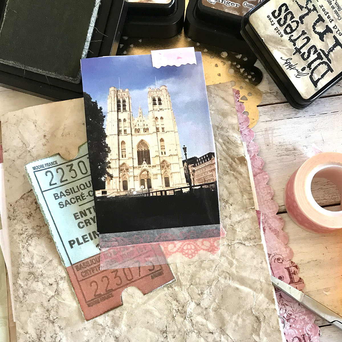 notre dame postcard on papers