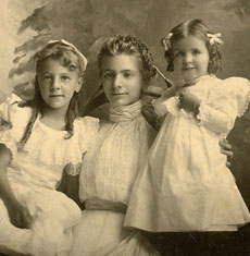 2 girls with mother antique photo