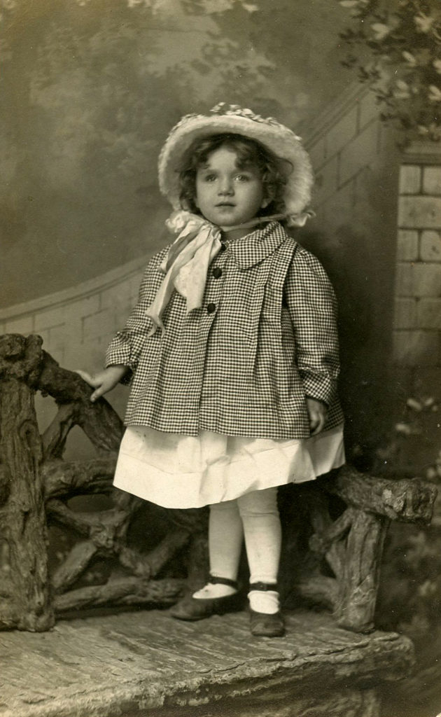 Vintage Girl with Gingham Coat