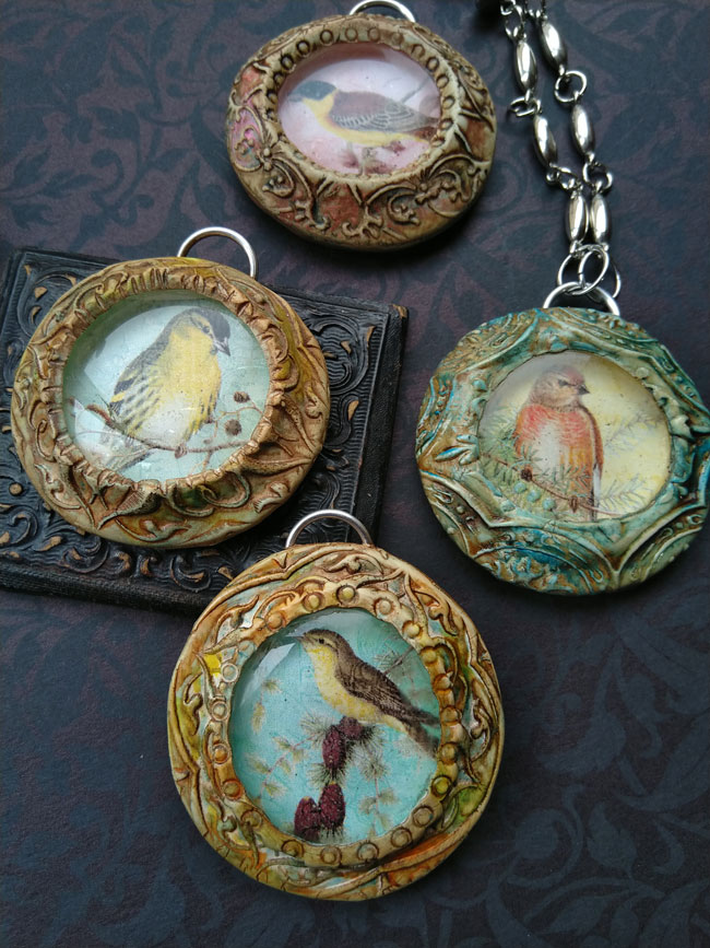 Bird pendants on table