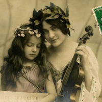 woman and girl with violin