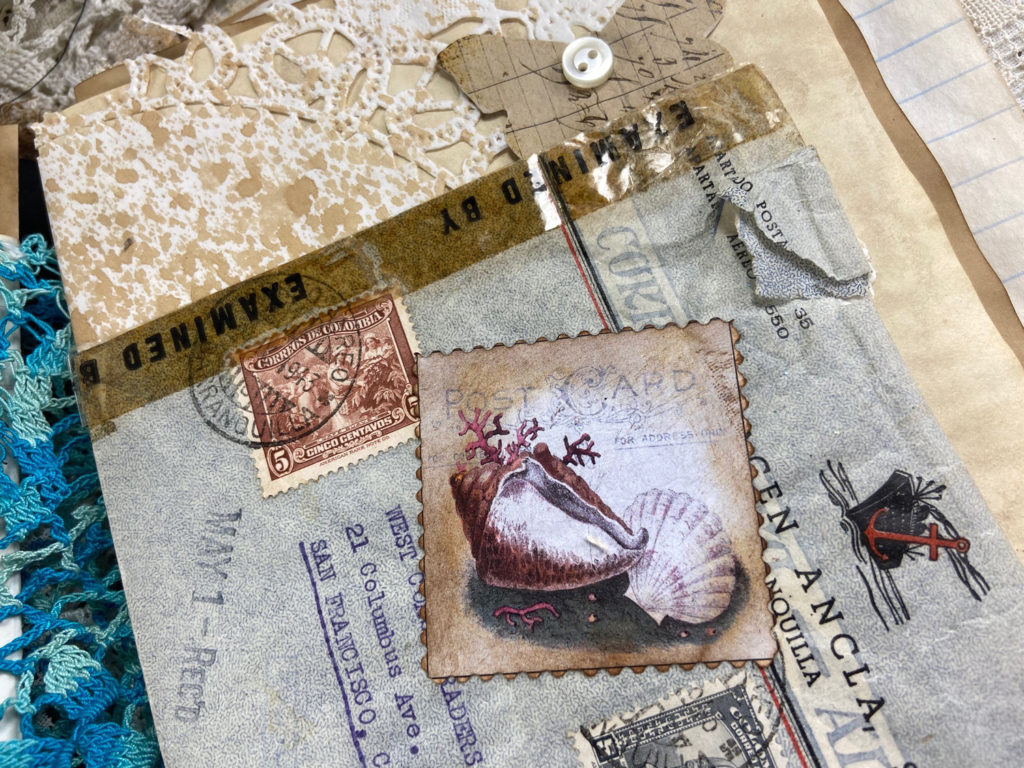 Seashells and ephemera in Junk Journal