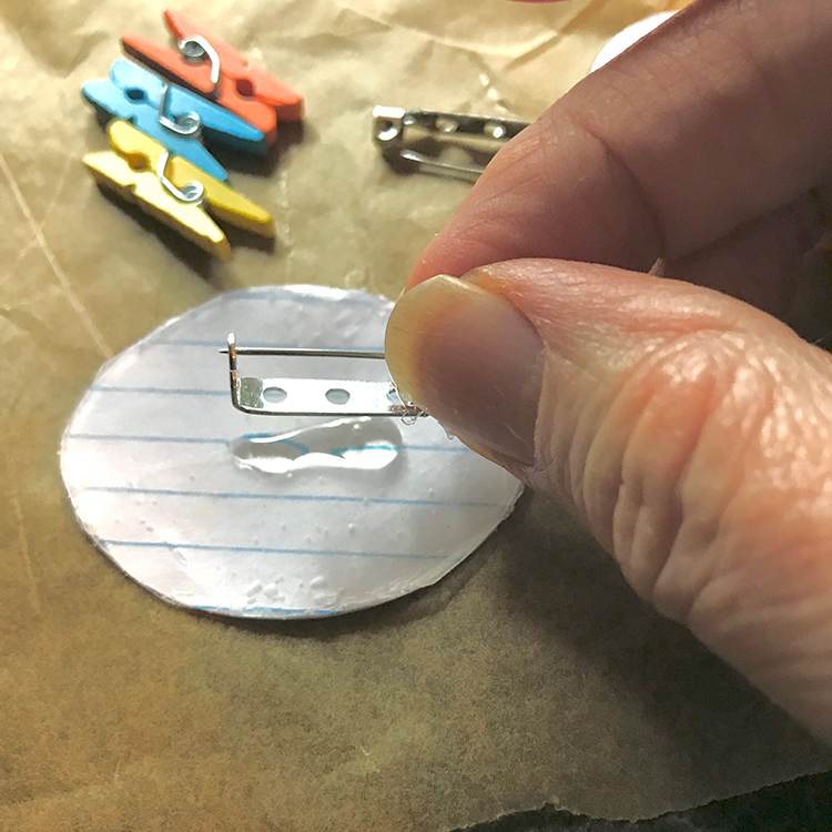 Place Pin Back Into Drop of Glue