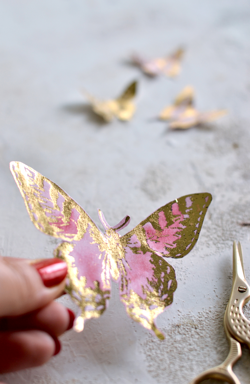 pink and gold butterfly