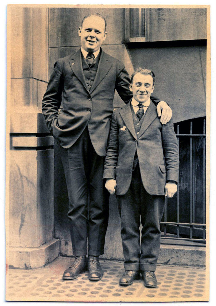 old photo short man tall man image