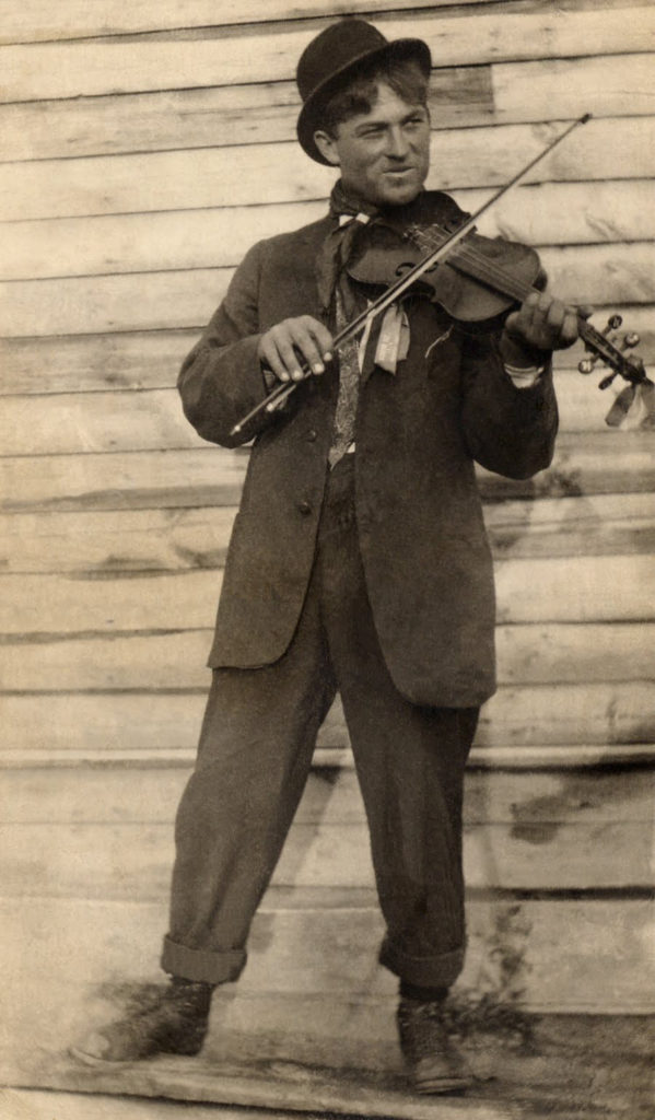 vintage photograph man playing violin fiddle clipart