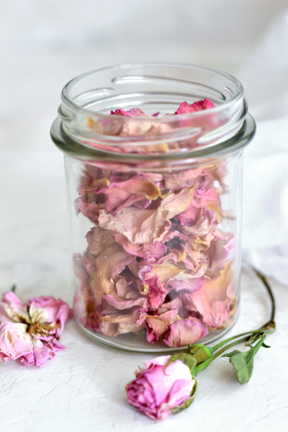 rose petals in jar