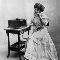 girl talking antique telephone image