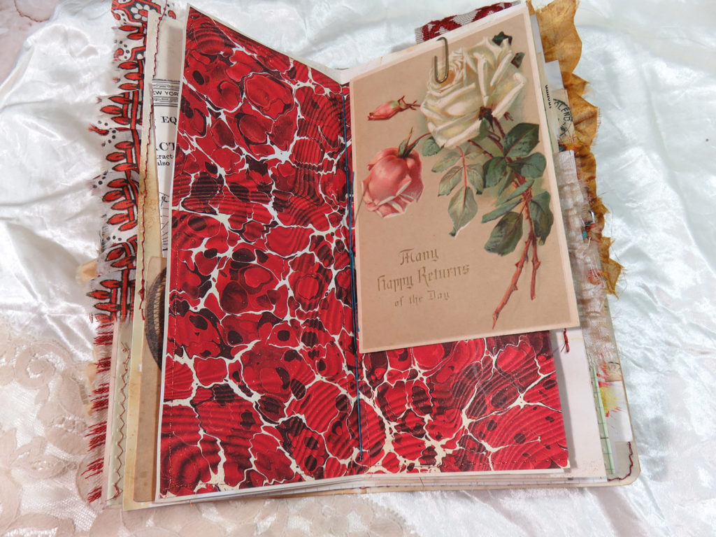 red marbled end paper journal page