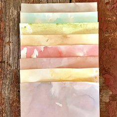 Pastel stained papers