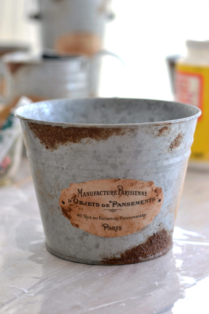 A close up of a galvanized pot