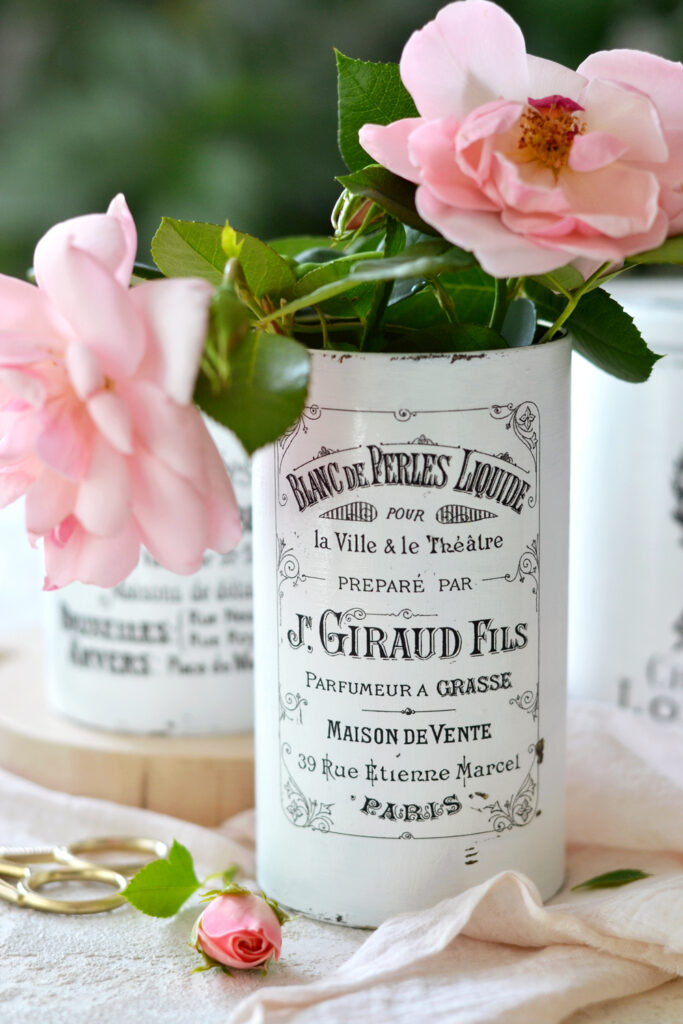 finished containers with french labels with pink roses