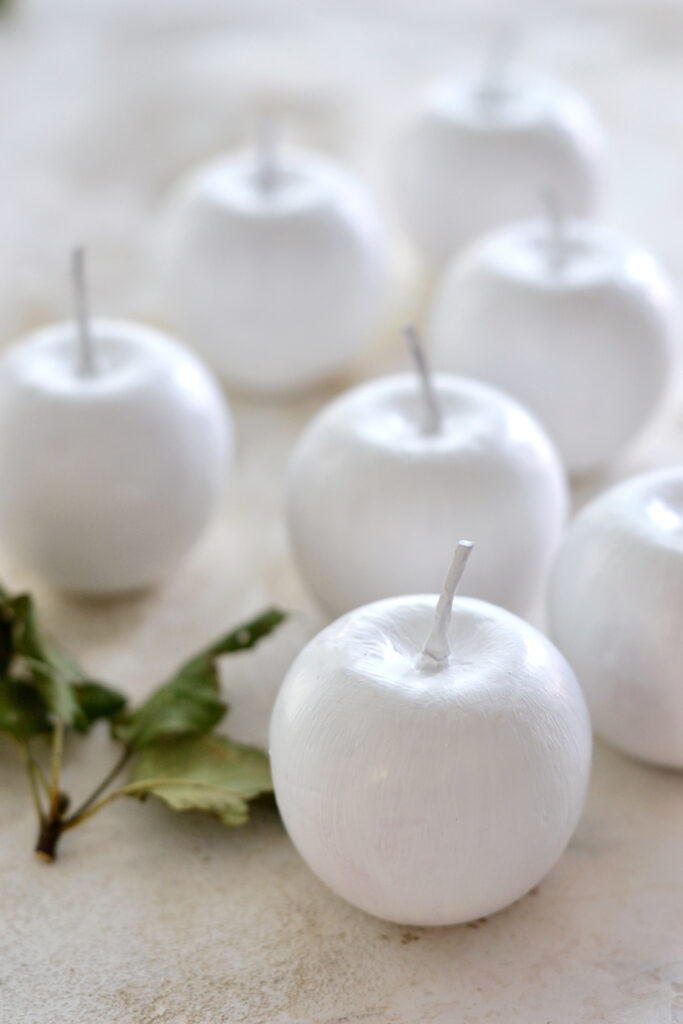 painted apples on table