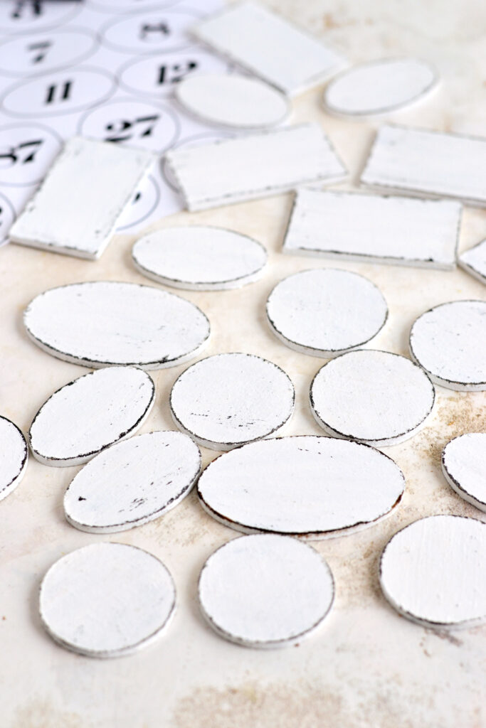 Painted wood discs for enamel tags