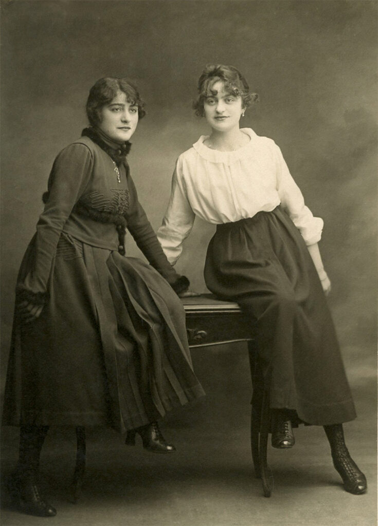 two sisters leaning image