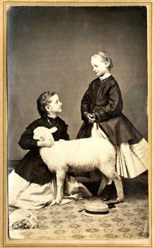black white photograph girls lamb image