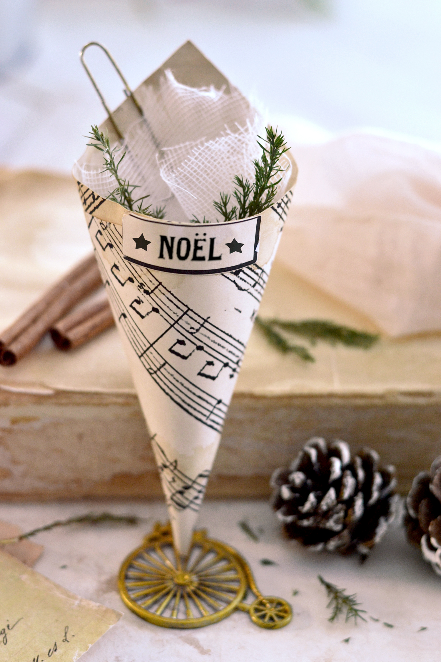 Vintage Christmas Paper cone placed against a vintage book