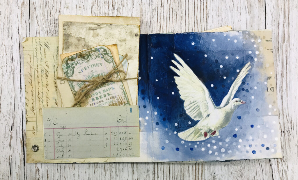 page spread vintage ephemera painted dove image