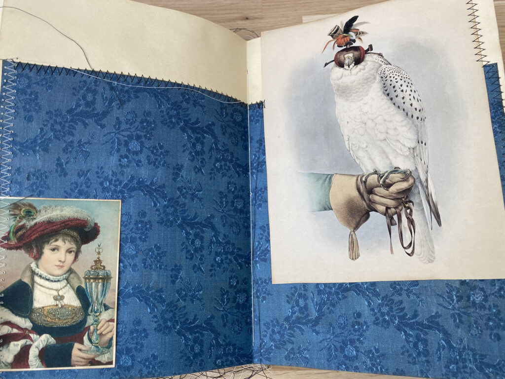 blue background medieval woman falcon page spread