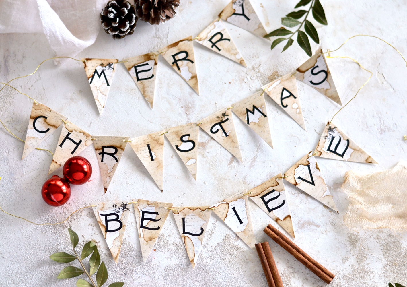 The final Merry Christmas and Believe Christmas banners