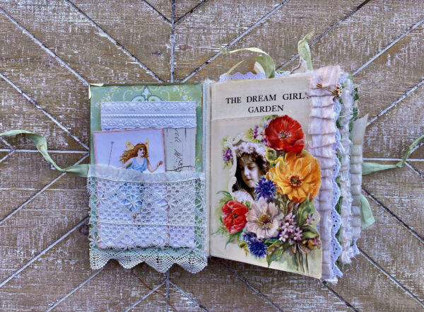 Junk journal spread with lace pocket and flowers