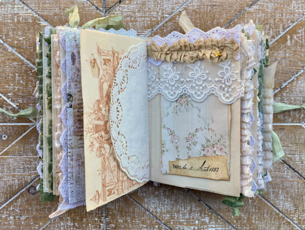 Junk journal spread with lace decoration