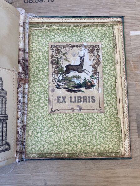 Pale green journal page with deer