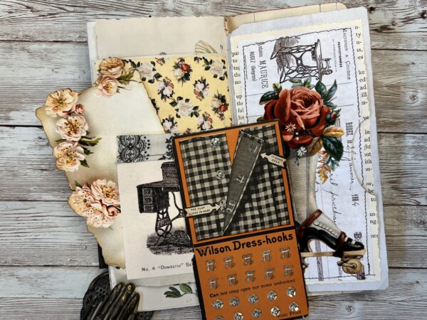 Junk journal spread with sewing ephemera