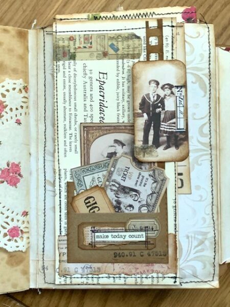 Junk journal spread with tags