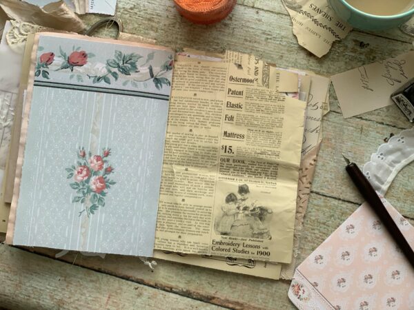 Junk journal spread with old newspaper
