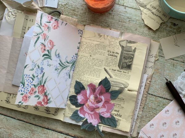 Junk journal spread with rose cut out