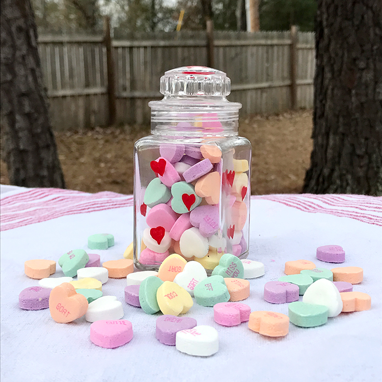 Painted glass jar with candy