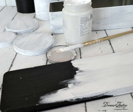 applying white acrylic paint