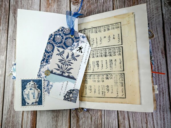 Blue and white collaged tag
