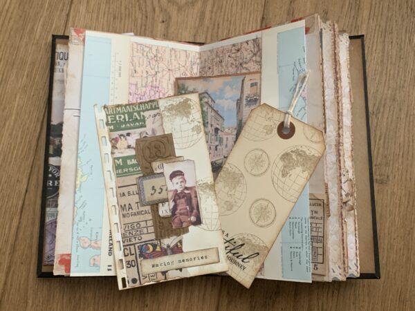 Junk journal spread with tag