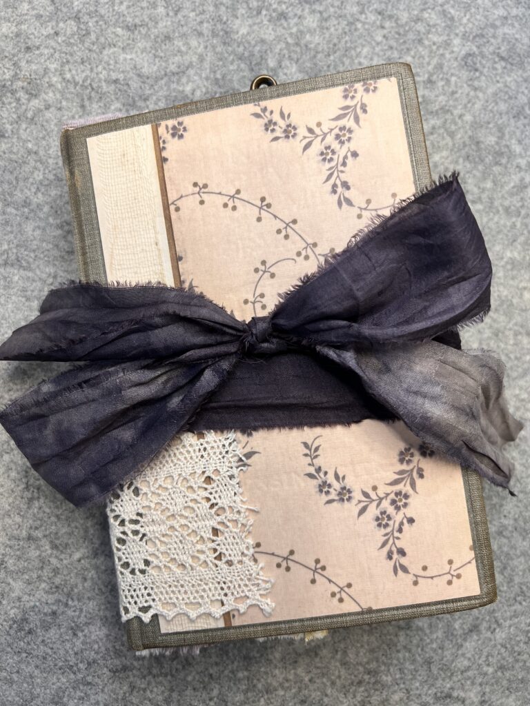 Junk journal cover with black ribbon