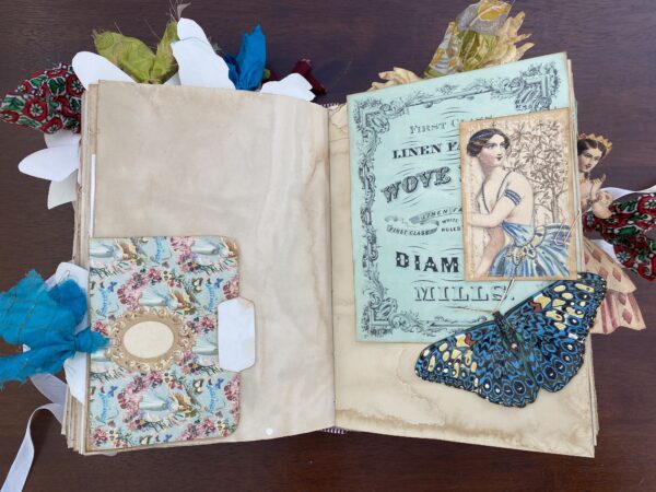 Junk journal spread with blue butterfly