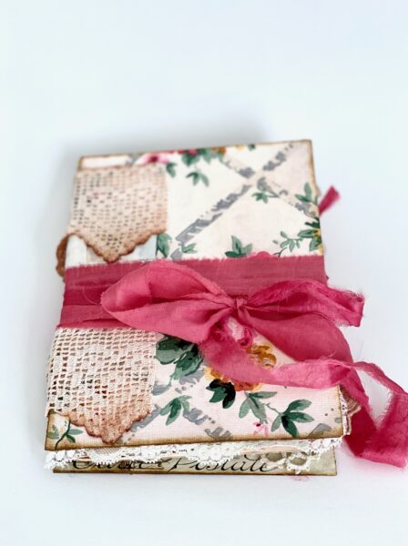Junk journal cover with pink ribbon