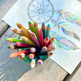 Color Pencils with Dream Catcher in Back