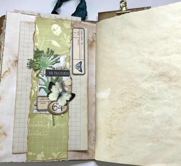 Junk journal spread with tea stained page