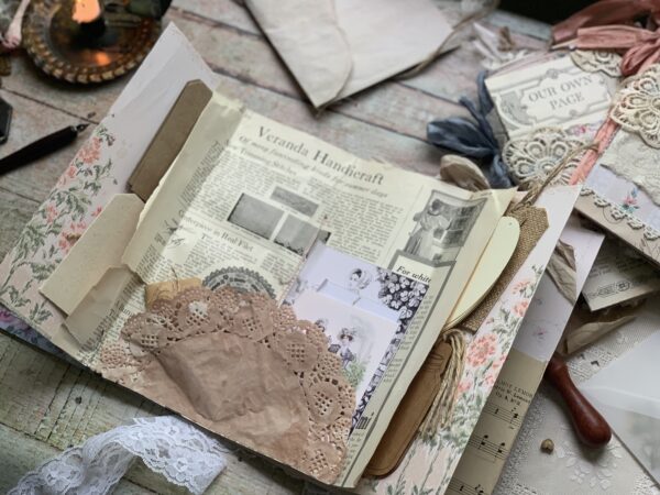 Junk journal spread with doily pocket