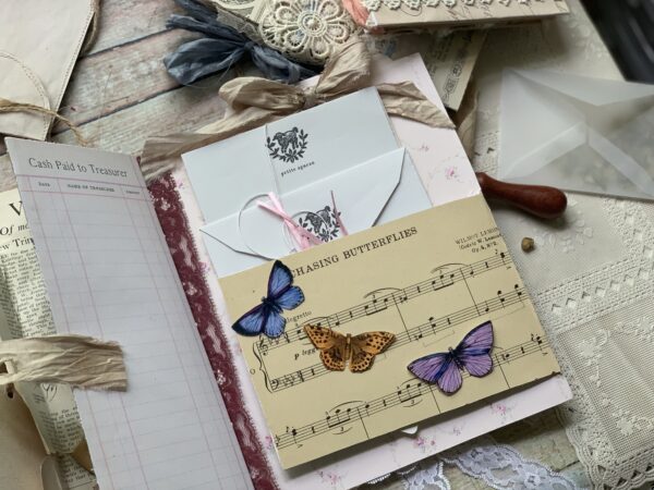 Junk journal spread with butterfly motifs