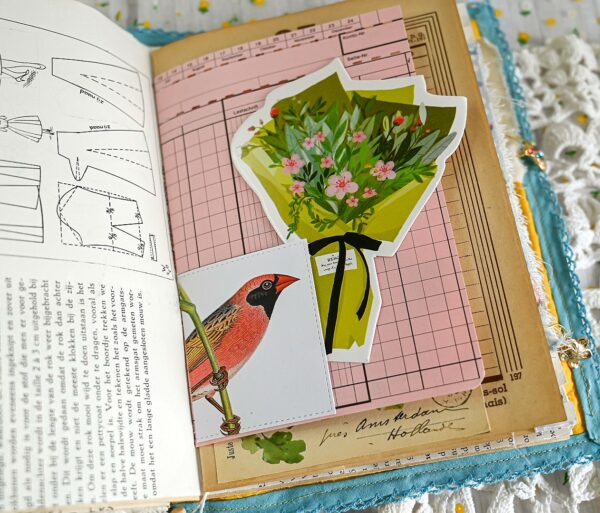 Junk journal spread with red finch