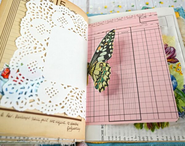 Junk journal spread with butterfly