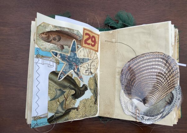 Junk journal spread with shell image