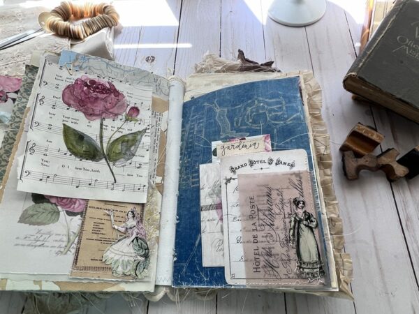 Junk journal spread with blue page