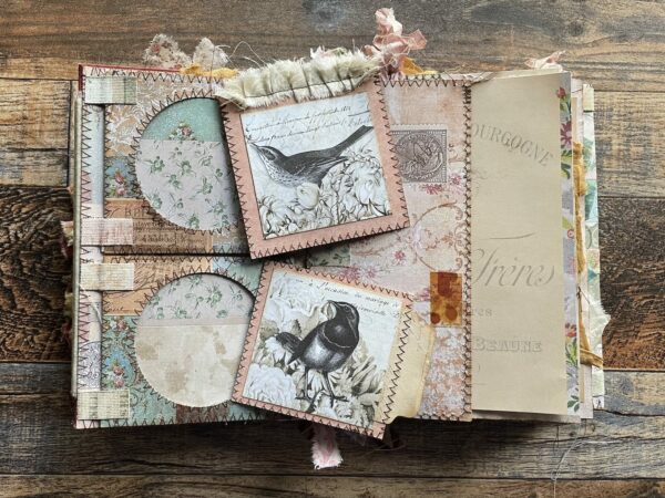 Junk journal spread with two bird images