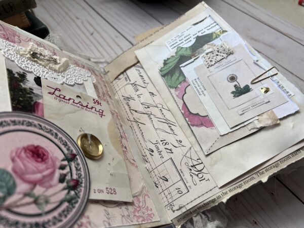 Junk journal spread with pink ephemera