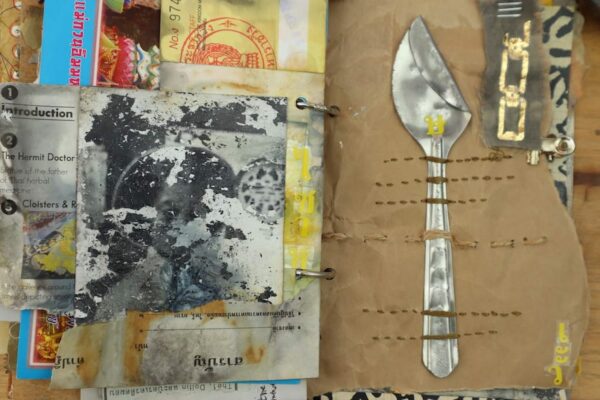 Junk journal spread with spoon attached